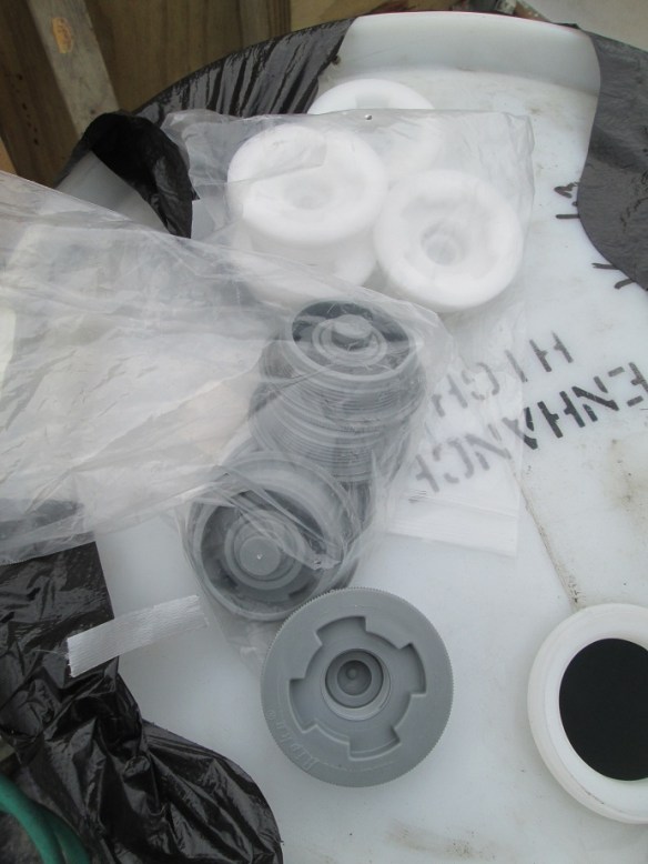 Our dear friend Anthony supplied us with drum caps for our passive solar heat!